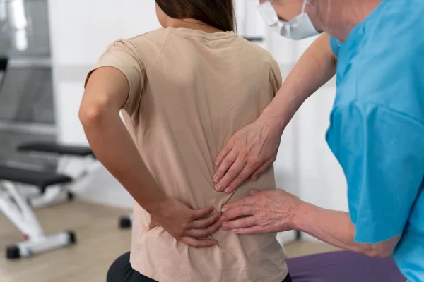 medical-assistant-helping-patient-with-physiotherapy-exercises_23-2149071459